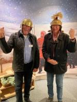 Swedish Rotarians trying Viking helmets in Market Harborough museum during Fellowship Exchange